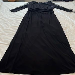 Long black jersey dress with embellished sleeves